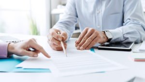 Business people negotiating a contract business people negotiating a contract 300x169